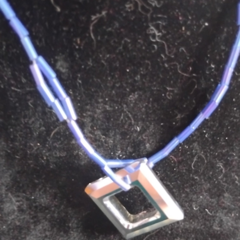 Blue Beaded Necklace with Silver Pendant